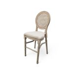Louis cane back barstool in natural wash with upholstered seat