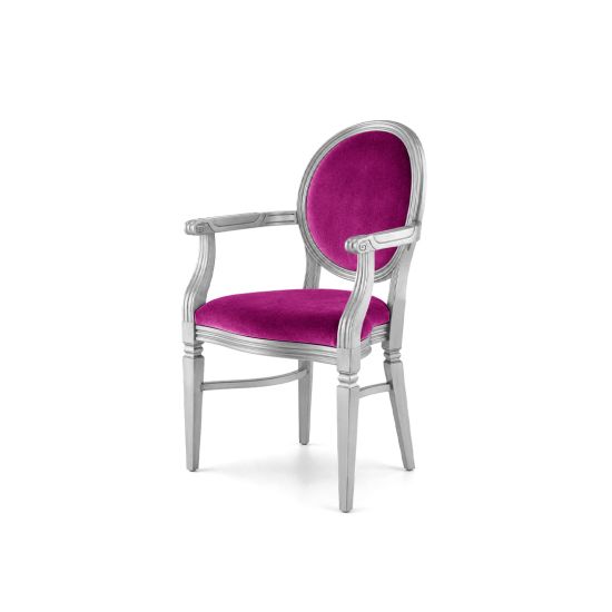 Luxury Chandelle armchair with a metallic silver frame and vibrant magenta velvet.