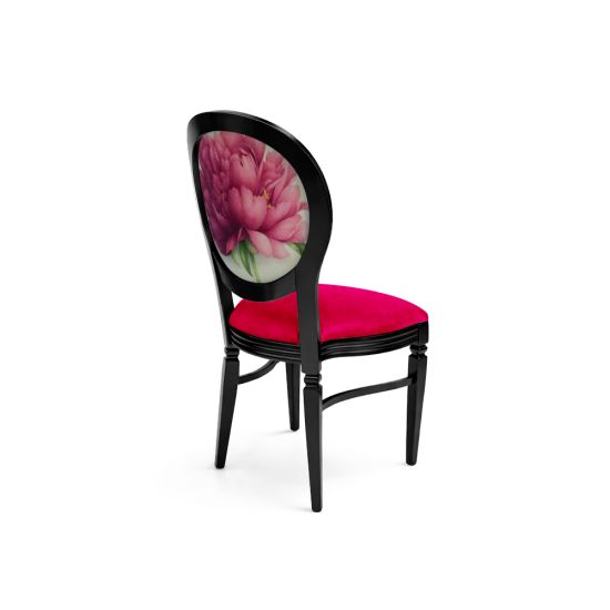 Black Chandelle chair with oval floral back and pink upholstered seat, elegant vintage-style banquet chair for weddings and formal events