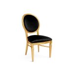 Gold Chandelle chair with oval back and black upholstery, elegant vintage-style banquet chair for weddings and formal events