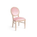 Natural Chandelle chair with oval floral back and blush upholstered seat, elegant vintage-style banquet chair for weddings and formal events