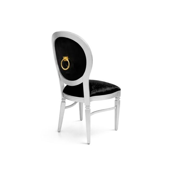 White Chandelle chair with oval back and gold ring accent, sleek vintage-style banquet chair for weddings and formal events