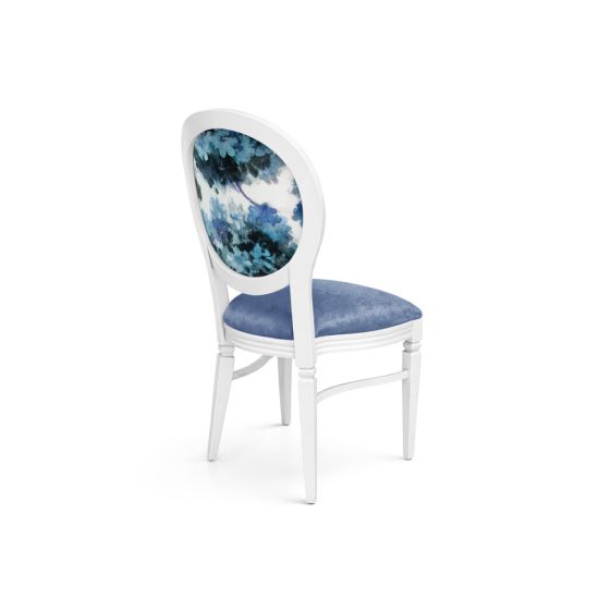 White Chandelle chair with oval floral back and blue upholstered seat, elegant vintage-style banquet chair for weddings and formal events