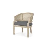 French country side chair with natural wood frame, cane back and sides, and dark gray upholstered seat, vintage seating for events.