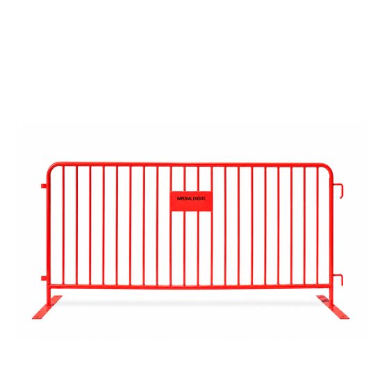 Red metal crowd control barrier with vertical bars and stabilizing feet, portable safety barricade for event lines, restricted areas, and venue security