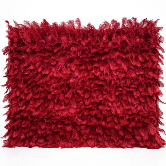 Deep red feather-style plume wall backdrop with layered texture, dramatic photo backdrop panel for luxury weddings and event staging.