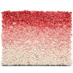 Ombre flower wall backdrop with red, blush, and ivory blooms in horizontal bands, romantic wedding photo backdrop panel for events.