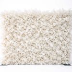 White foliage wall backdrop with layered leaf texture, elegant neutral photo backdrop panel for weddings and upscale event staging.