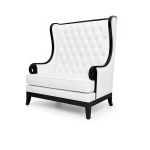 Empire loveseat in white with black frame, tall wingback and tufted upholstery, modern lounge seating rental for weddings and events.