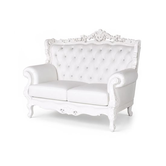 White Empress tufted loveseat with ornate carved frame and high back, elegant lounge seating rental for weddings, showers, and events.