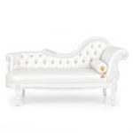 White Empress right-facing chaise lounge with tufted back and round accent pillow, elegant lounge seating rental for weddings and events.