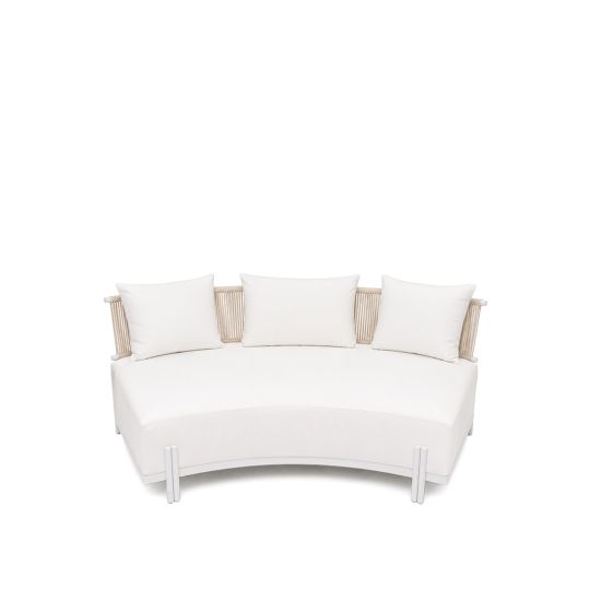 Laguna Crescent curved sofa with ivory upholstery, rope-woven backrest, white frame, and three accent pillows.