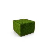 Grass coffee table covered in green artificial turf with rectangular cube design, modern outdoor table rental for events and lounges.