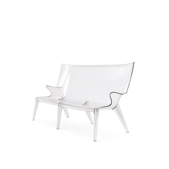 Clear acrylic Uncle Jack sofa with transparent molded seat and arms, modern statement lounge seating for events and stylish setups
