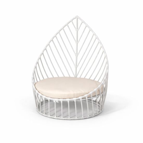 White leaf chair with sculptural open leaf frame and seat cushion, modern accent chair rental for weddings and event lounges.