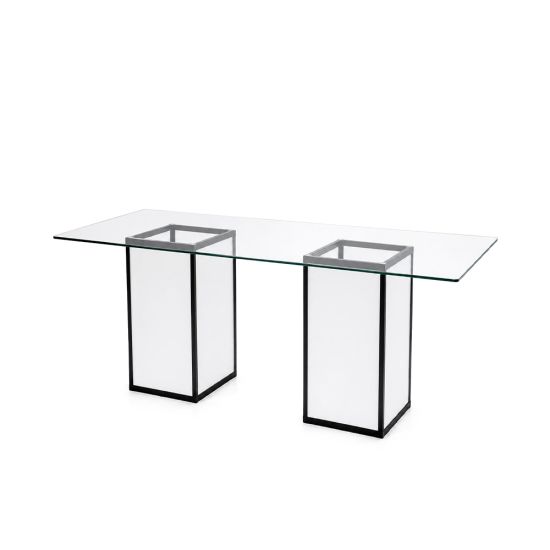 clear glass-top rectangular high-boy table supported by two white panel bases trimmed in dark frame from Skyline collection for event rental