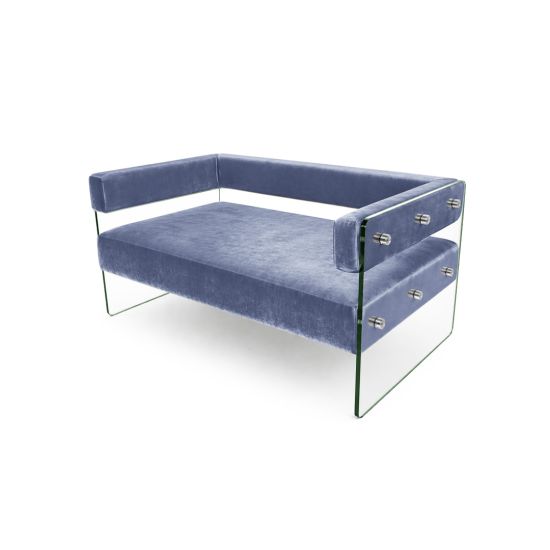 Modern Dusty Blue velvet loveseat with clear glass side panels and low backrest, contemporary crystal sofa seating for upscale event lounges.
