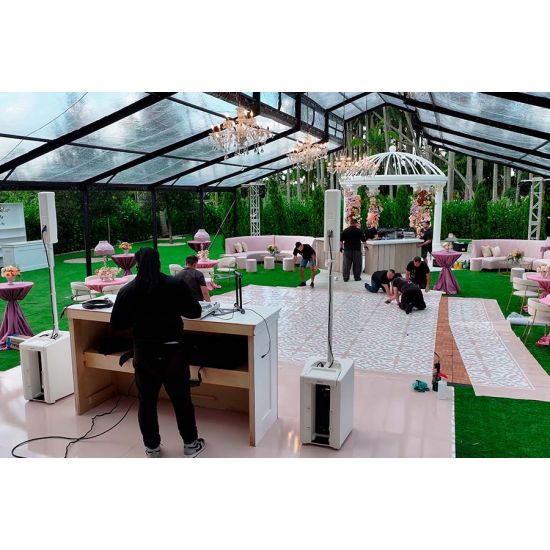 30′x100′ cathedral tent with black frame and clear top for elegant outdoor weddings and upscale events