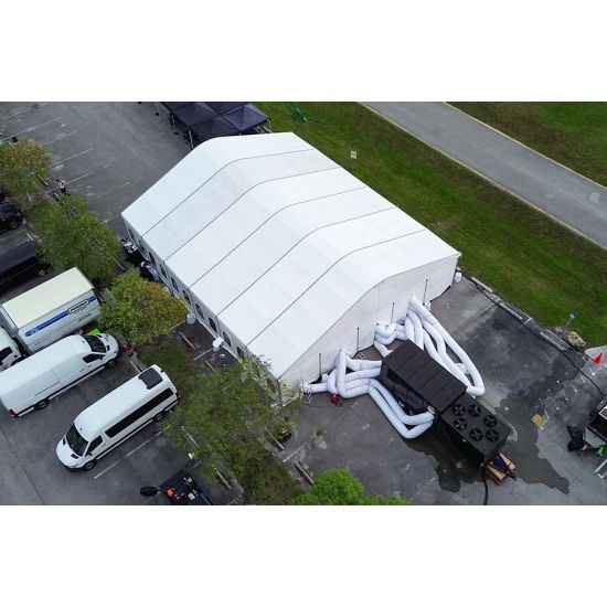 Trailer-mounted industrial air conditioner with multiple vent ports, 25–60 ton event cooling rental priced per square foot for large venues.