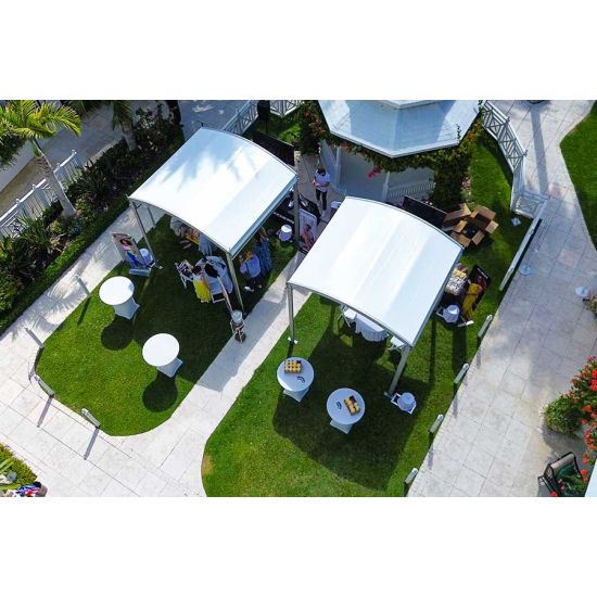 10'x80' curved event tent with silver frame and white arched roof, modern structure for outdoor events and rental setups