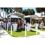 10'x80' curved event tent with silver frame and white arched roof, modern structure for outdoor events and rental setups