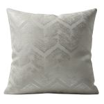 Light silver throw pillow with subtle zigzag and geometric texture pattern, modern neutral accent cushion for upscale events and lounge décor.