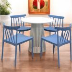 White Bohemian cocktail table with minimalist round top and light wood base for relaxed event lounge décor