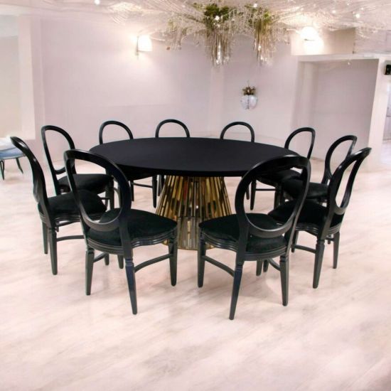“72″ round Bohemian dining table with black wood top and matching gold base, ideal for modern event dining and reception décor.