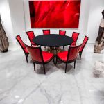 “72″ round Bohemian dining table with black wood top and matching gold base, ideal for modern event dining and reception décor.