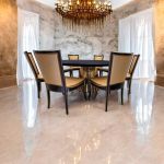“72″ round Bohemian dining table with black wood top and matching gold base, ideal for modern event dining and reception décor.