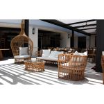Bohemian single hanging wicker bed with teardrop pod design and cushions, statement lounge rental for boho weddings and events.