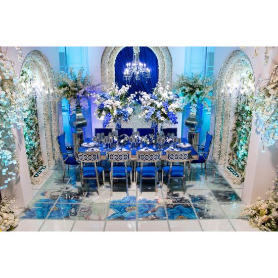 Silver metal Bottega armless banquet chair with Magenta upholstered cushion for luxury event seating