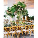 “Natural wood cross-back chair with natural jute cushion, X-shaped backrest and rustic-elegant event guest seating”