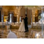 Gold oval-back event chair with polished metal frame and Gold upholstered seat, modern luxury seating ideal for weddings and upscale receptions.