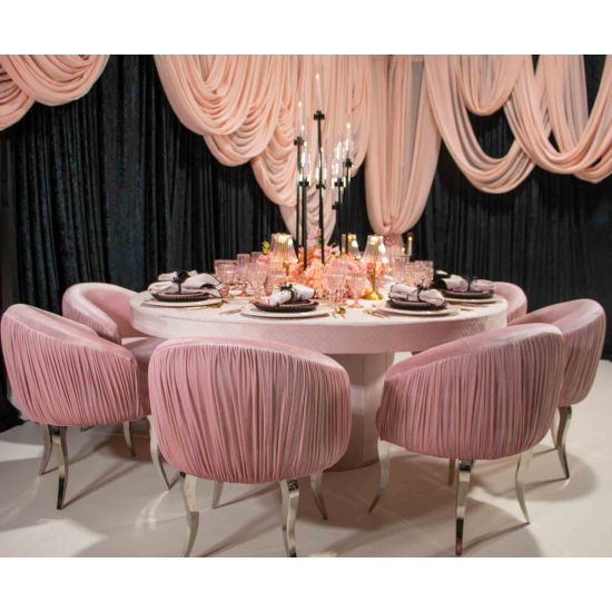 Black velvet reflection armchair with curved backrest, pleated side detailing, and sleek silver mirrored legs, designed for luxury lounge and event seating.