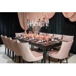 Isabella dining chair with Light Pink upholstered seat and curved high back, black wood legs, sleek modern seating for weddings and events.