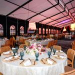 “Natural wood Broadway chair with slatted vertical back and plain wooden seat, stylish guest seating for weddings and banquets.”