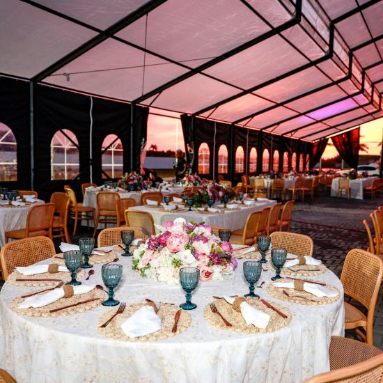 “Natural wood Broadway chair with slatted vertical back and plain wooden seat, stylish guest seating for weddings and banquets.”