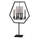 Black hexagon chandelier stand with hanging crystal-style candle sleeves, modern geometric statement décor for weddings and events.
