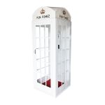 White luxury telephone booth with glass panel doors and red interior flooring, photo booth-style wedding rental.