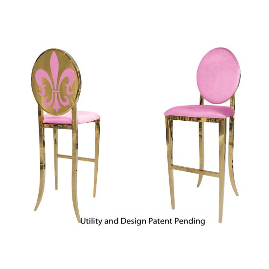Gold Fleur-de-lis bar stool with Light Pink cushioned seat, ornate metal fleur-de-lis backrest and foot-rail base, luxury event bar seating