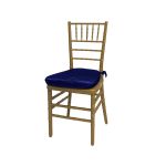 Gold resin Chiavari chair with Royal Blue cushion seat, spindled high back and slim four-leg frame, elegant event seating