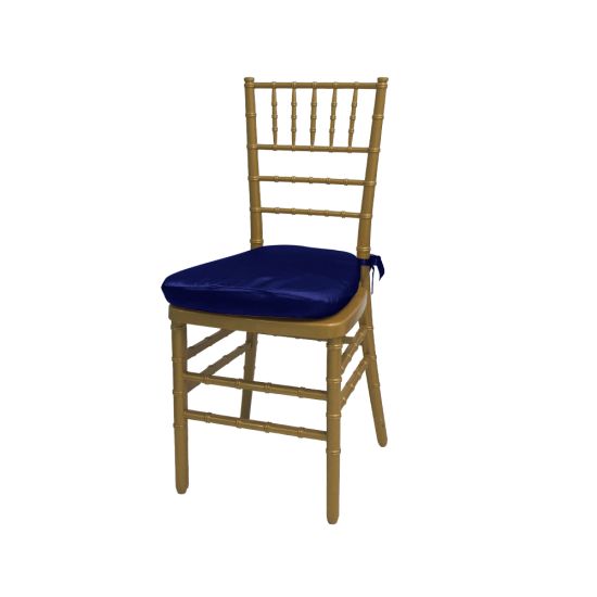 Gold resin Chiavari chair with Royal Blue cushion seat, spindled high back and slim four-leg frame, elegant event seating
