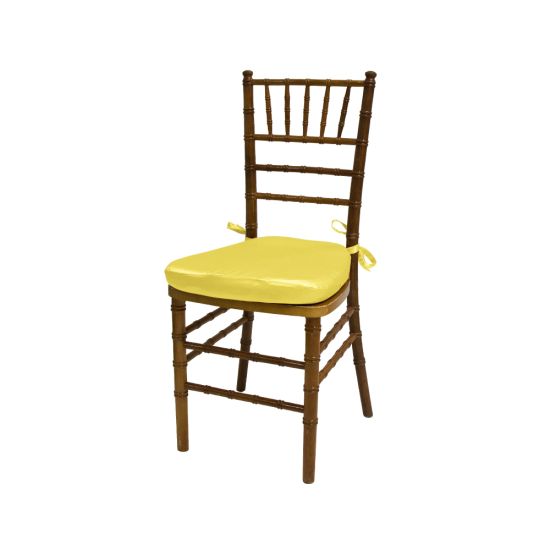 Chiavari chair with natural wood finish, Yellow colored padded seat, elegant slatted backrest, and stylish seating for event guests.