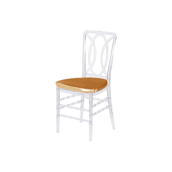 Clear resin Clash chair with Gold cushioned seat and intertwined oval backrest, sleek modern event seating.
