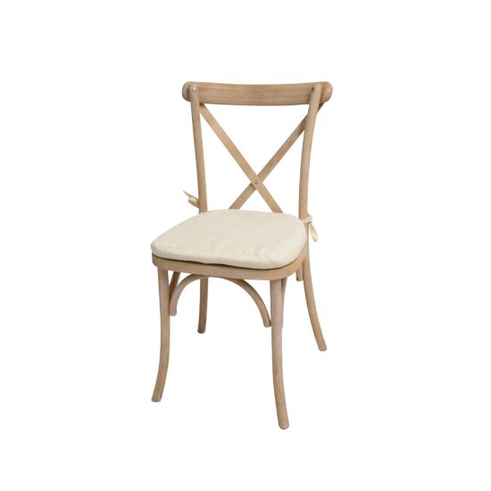 “Light-wood cross-back chair with ivory cushion, X-shaped backrest and rustic elegant event guest seating”