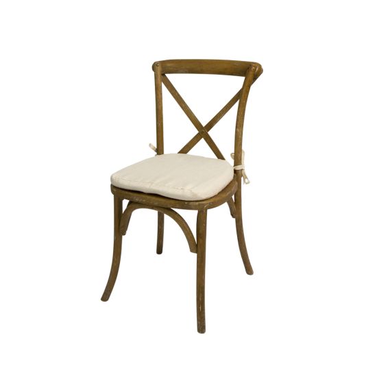 Lime wood cross-back chair with ivory cushion, X-shaped backrest and rustic natural event guest seating