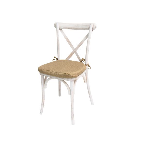 “White-wash wood cross-back chair with natural jute cushion, X-shaped backrest and rustic bohemian event guest seating”