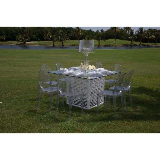 “Clear resin armless ghost chair with high oval backrest and transparent sleek frame, modern event guest seating”