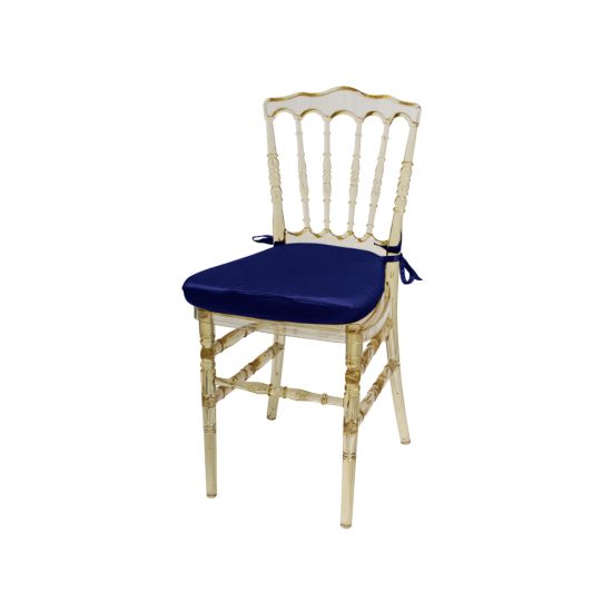 Amber resin Napoleon chair with Royal Blue cushioned seat, high spindled backrest and translucent event-grade frame
